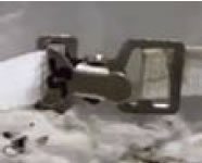 Figure 19 A belt used to tension the strap at the lower edge of a module cover. Belts should be in good condition, and knots should not be substituted for a damaged buckle. Set aside damaged covers and use a good condition cover